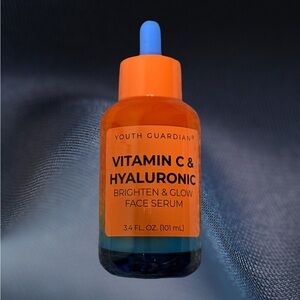Orange and Blue Skincare Serum with Vitamin C and Hyaluronic Acid